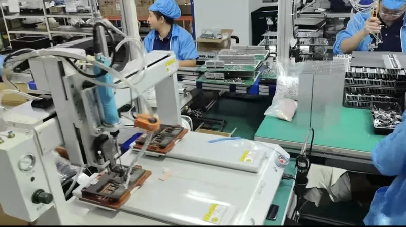HOMESOL workers at production and assembly workstations
